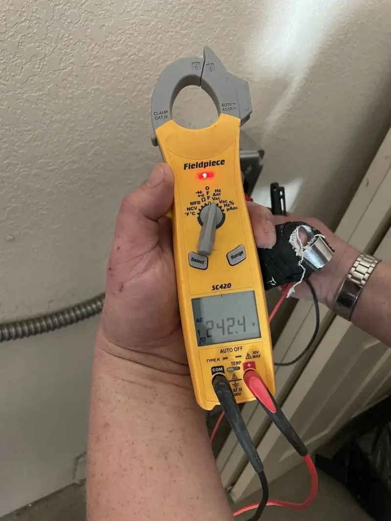 Voltage testing with clamp meter during Generator Installation in San Rafael